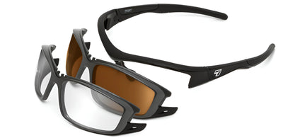 Three pairs of 7eye Rocker Sunglasses, featuring sporty designs with black frames and shatter-resistant brown lenses for safety, are displayed on a white surface. Designed by 7eye for medium to large faces, these sunglasses provide reliable UVA/UVB protection.
