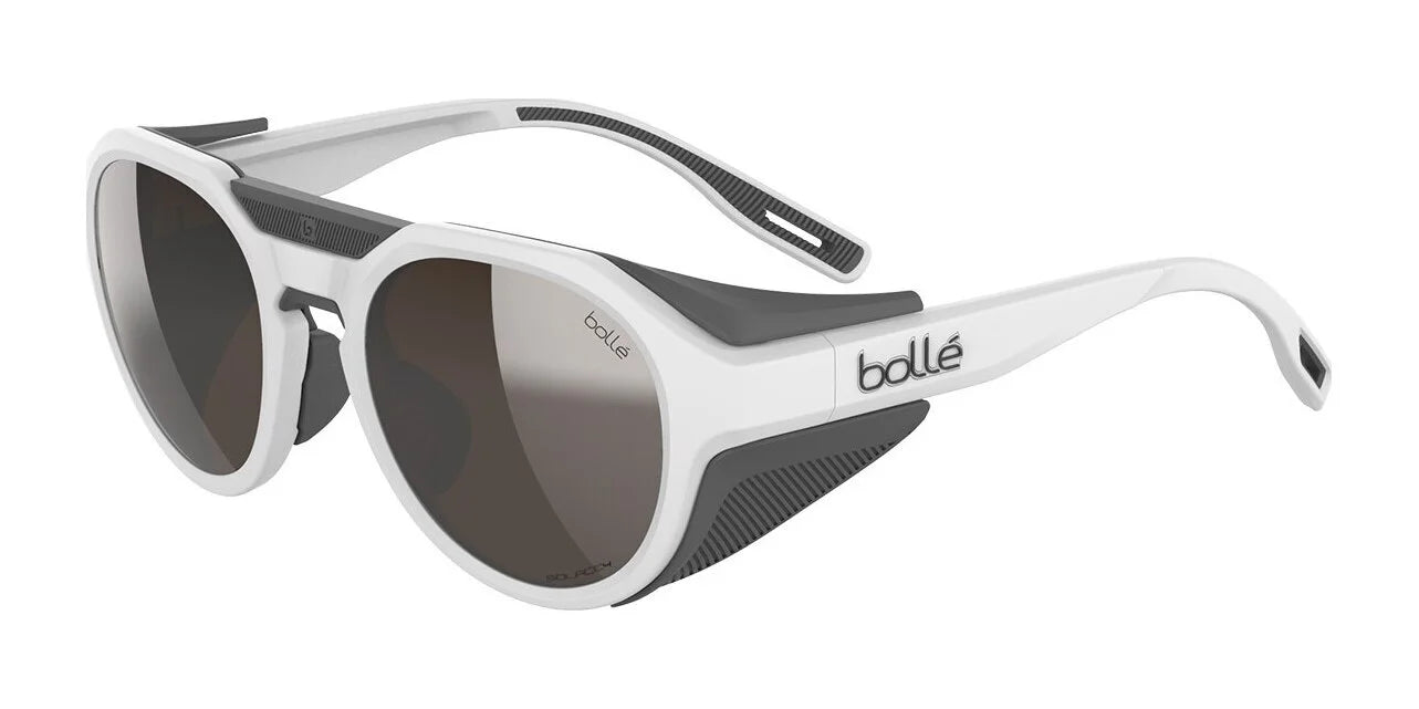 White Matte II Bolle ASCENDER Sunglasses, Size 51, with dark lenses and removable side shields, shown on a white background. White Matte II Bolle ASCENDER Sunglasses, Size 51, with dark lenses and removable side shields, shown on a white background.