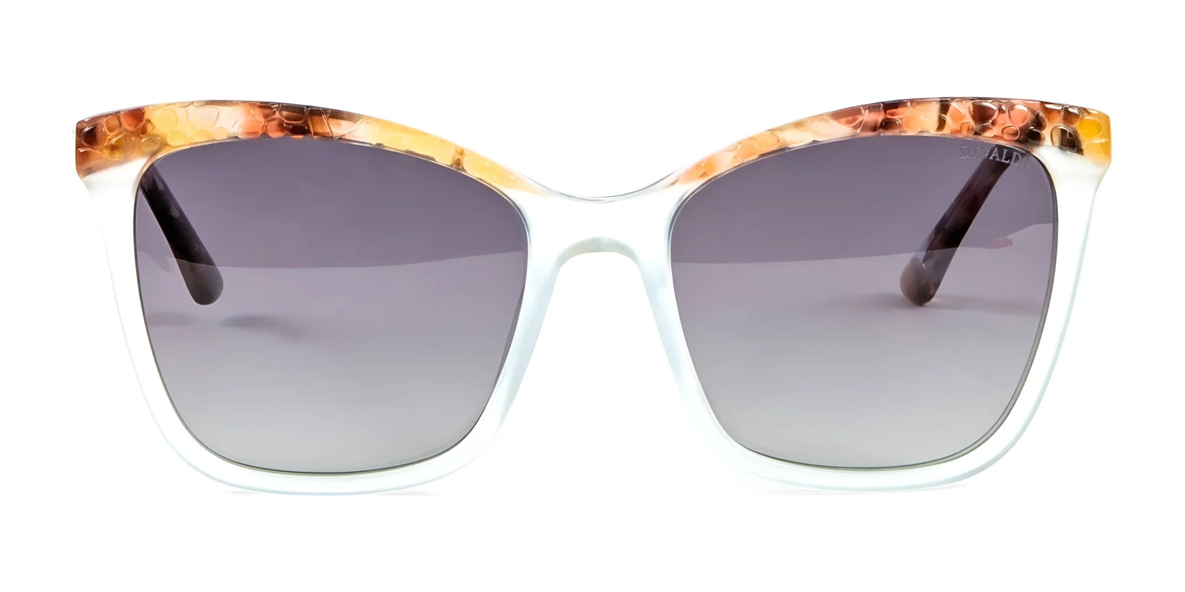 The Di Valdi DV0158 cat eye sunglasses by Di Valdi feature brown patterned tops, gradient dark lenses, and provide stylish UV protection. The Di Valdi DV0158 cat eye sunglasses by Di Valdi feature brown patterned tops, gradient dark lenses, and provide stylish UV protection.
