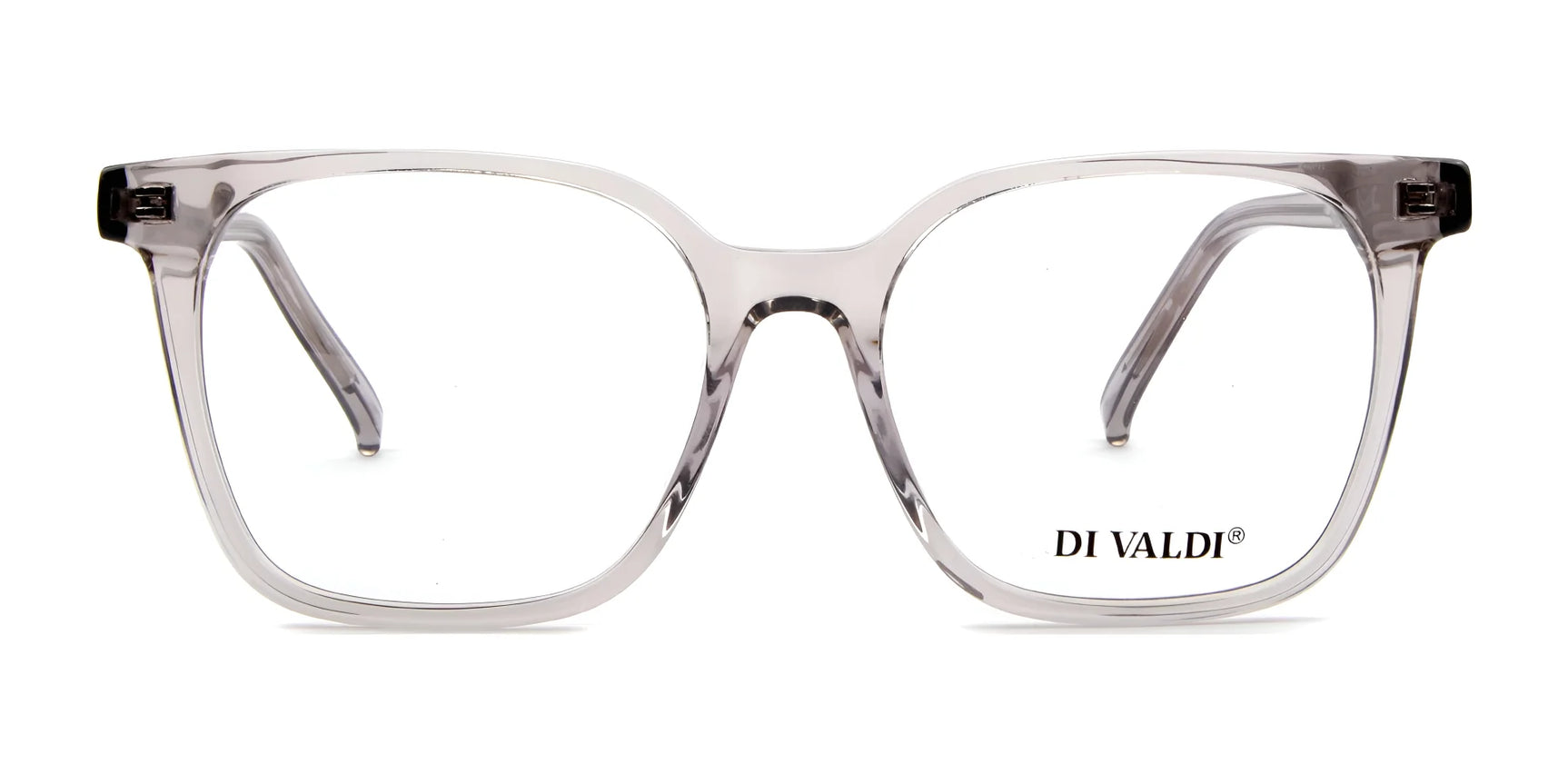 Sleek, clear square eyeglasses with transparent rims and the Di Valdi logo on the right lens. Experience style and sophistication with Di Valdi DVO8186 Eyeglasses | Size 51. Sleek, clear square eyeglasses with transparent rims and the Di Valdi logo on the right lens. Experience style and sophistication with Di Valdi DVO8186 Eyeglasses | Size 51.
