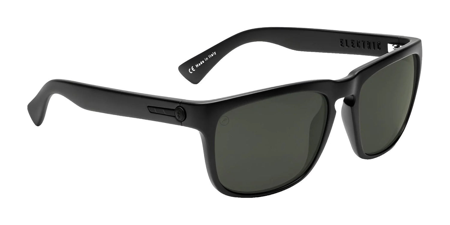 Electric Knoxville XL Sunglasses | Size 61 by Electric in black with rectangular frames and dark lenses, shown angled on a white background. Lightweight for all-day comfort and superior sun protection. Electric Knoxville XL Sunglasses | Size 61 by Electric in black with rectangular frames and dark lenses, shown angled on a white background. Lightweight for all-day comfort and superior sun protection.