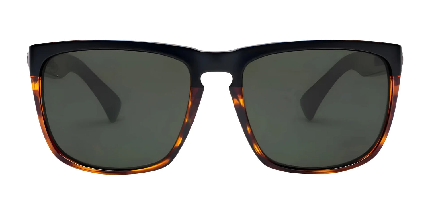 Electric Knoxville XL Sunglasses | Size 61 by Electric feature a brown tortoiseshell frame, dark lenses, and a flat top for lightweight comfort and superior sun protection, shown on a white background. Electric Knoxville XL Sunglasses | Size 61 by Electric feature a brown tortoiseshell frame, dark lenses, and a flat top for lightweight comfort and superior sun protection, shown on a white background.