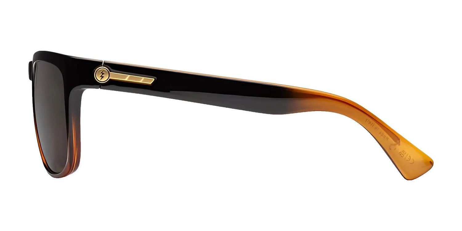 Side view of Electric Knoxville XL Sunglasses | Size 61 by Electric, featuring a black and brown frame with gold temple detailing, dark lenses, and a lightweight fit for excellent sun protection. Side view of Electric Knoxville XL Sunglasses | Size 61 by Electric, featuring a black and brown frame with gold temple detailing, dark lenses, and a lightweight fit for excellent sun protection.