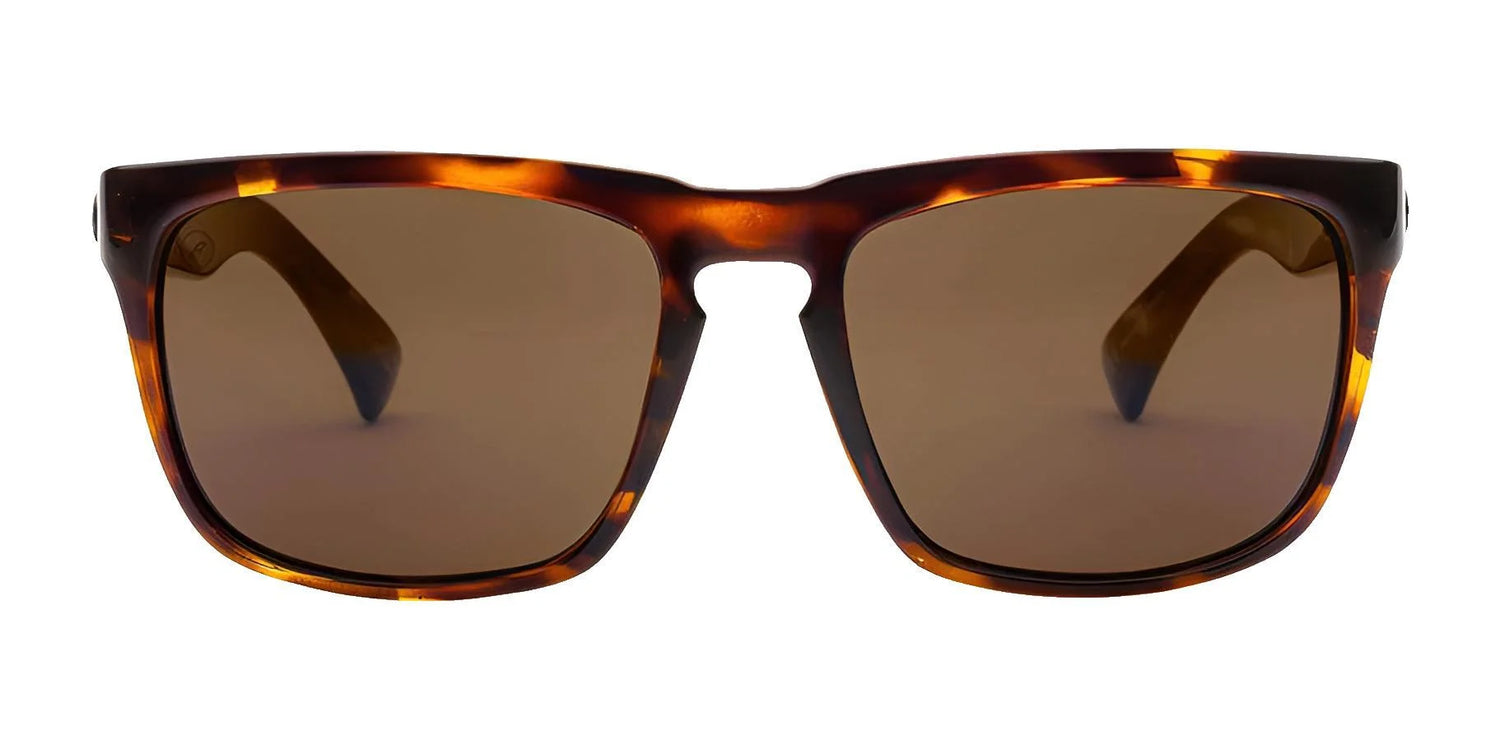 Electric Knoxville XL Sunglasses | Size 61 by Electric feature brown tortoiseshell rectangular frames and dark lenses, delivering superior sun protection in a lightweight, comfortable design shown from the front. Electric Knoxville XL Sunglasses | Size 61 by Electric feature brown tortoiseshell rectangular frames and dark lenses, delivering superior sun protection in a lightweight, comfortable design shown from the front.
