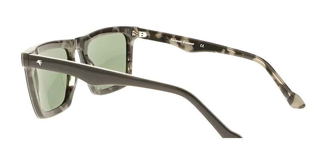 Side view of the chic Fatheadz MONSOON Sunglasses showcasing oversized tortoiseshell-patterned frames with green polarized lenses. Side view of the chic Fatheadz MONSOON Sunglasses showcasing oversized tortoiseshell-patterned frames with green polarized lenses.