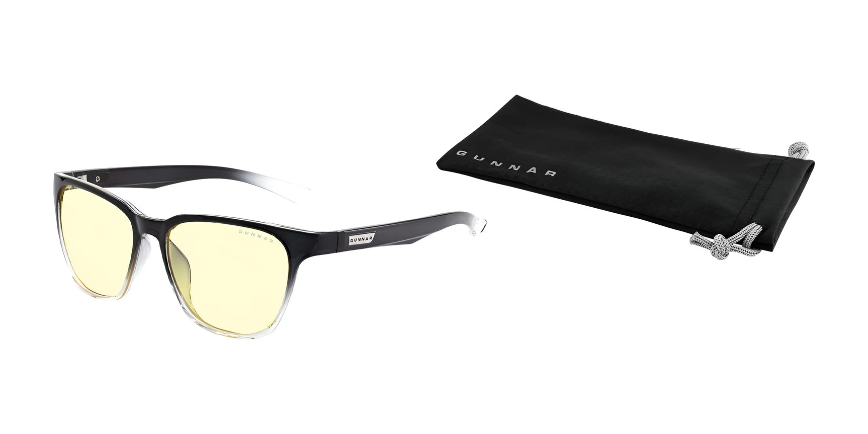 The Gunnar Berkeley Computer Glasses | Size 54, featuring black frames and yellow-tinted anti-reflective lenses, sit stylishly beside a black pouch on a white backdrop. Designed for comfort and protection, they offer blue light protection while remaining functional and chic. The Gunnar Berkeley Computer Glasses | Size 54, featuring black frames and yellow-tinted anti-reflective lenses, sit stylishly beside a black pouch on a white backdrop. Designed for comfort and protection, they offer blue light protection while remaining functional and chic.