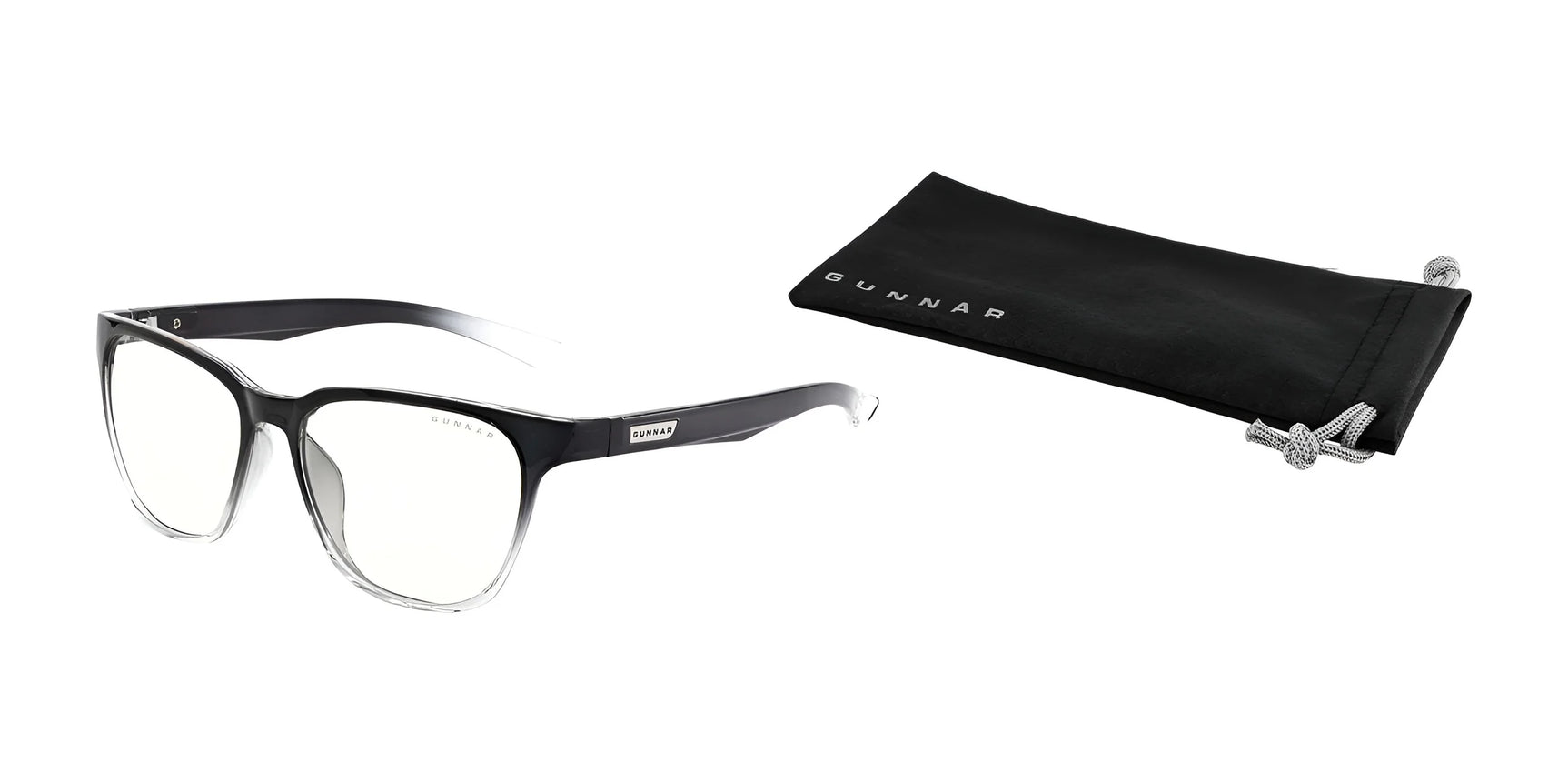 Black and white Gunnar Berkeley Computer Glasses with anti-reflective lenses lie next to a black Gunnar pouch on a pristine white background. Black and white Gunnar Berkeley Computer Glasses with anti-reflective lenses lie next to a black Gunnar pouch on a pristine white background.