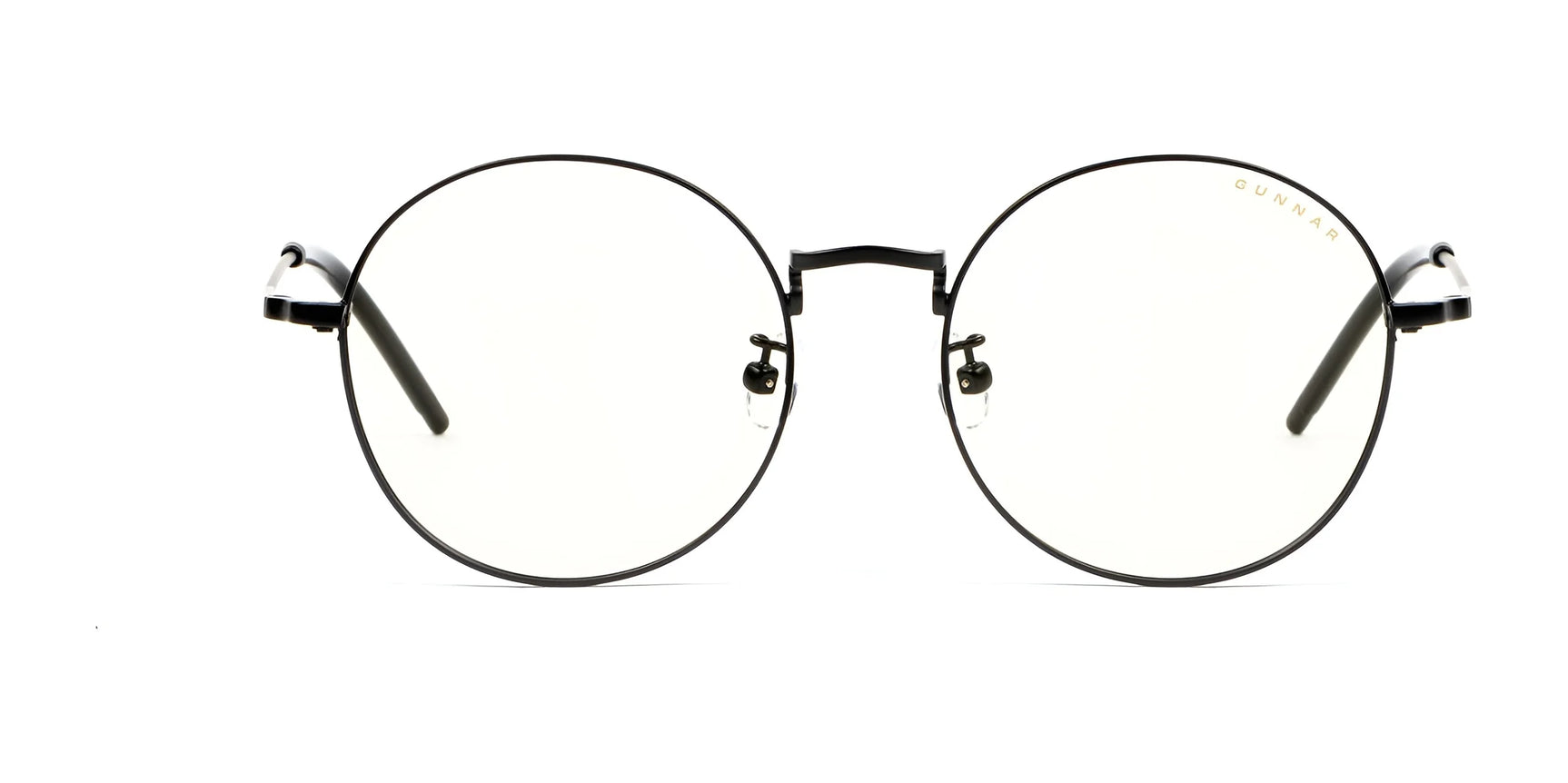 Round Gunnar Ellipse Computer Glasses, featuring thin black stainless-steel frames and equipped with a blue light filter, displayed on a white background. Round Gunnar Ellipse Computer Glasses, featuring thin black stainless-steel frames and equipped with a blue light filter, displayed on a white background.