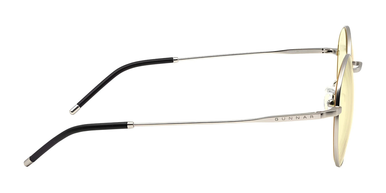 Side view of sleek stainless steel-framed, round-lensed Gunnar Ellipse Computer Glasses in size 51 with black tips and blue light filter. "GUNNAR" logo on the arm adds style and function seamlessly. Side view of sleek stainless steel-framed, round-lensed Gunnar Ellipse Computer Glasses in size 51 with black tips and blue light filter. "GUNNAR" logo on the arm adds style and function seamlessly.
