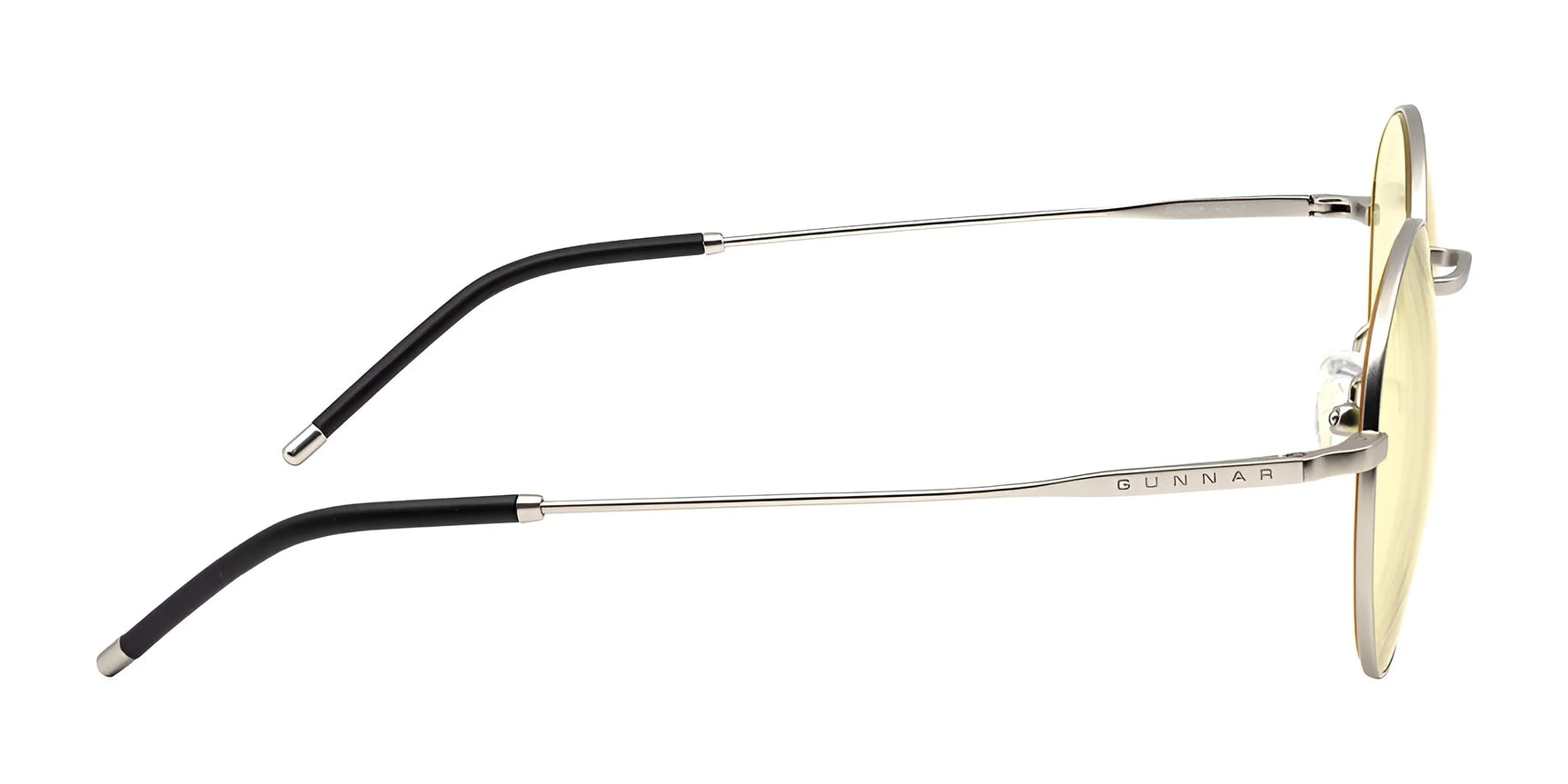 Side view of sleek stainless steel-framed, round-lensed Gunnar Ellipse Computer Glasses in size 51 with black tips and blue light filter. "GUNNAR" logo on the arm adds style and function seamlessly. Side view of sleek stainless steel-framed, round-lensed Gunnar Ellipse Computer Glasses in size 51 with black tips and blue light filter. "GUNNAR" logo on the arm adds style and function seamlessly.