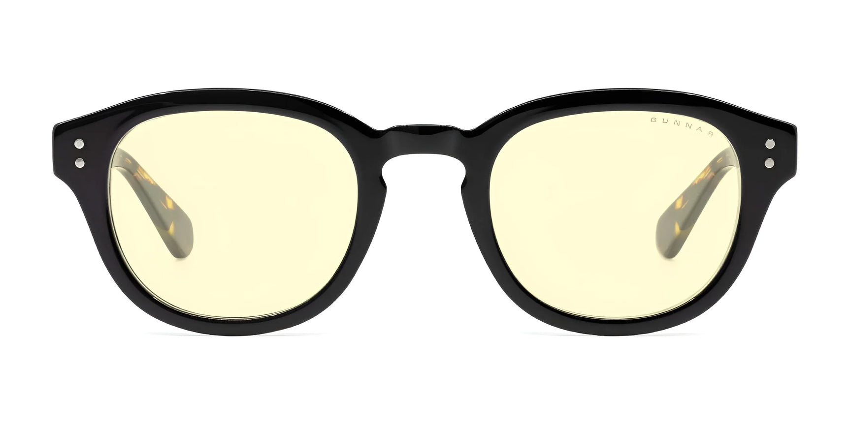 The Gunnar Emery Computer Glasses by Gunnar, size 47, feature a black premium frame design with yellow-tinted lenses and blue light blocking technology, displayed on a white background. The Gunnar Emery Computer Glasses by Gunnar, size 47, feature a black premium frame design with yellow-tinted lenses and blue light blocking technology, displayed on a white background.