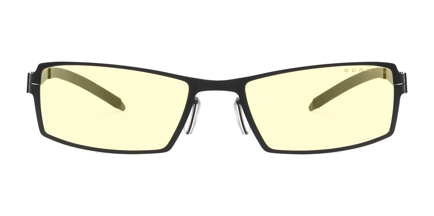 Gunnar's Sheadog Computer Glasses, featuring black frames, GUNNAR lens material, and rectangular yellow-tinted lenses for blue light blocking, are stylishly set against a white background. Gunnar's Sheadog Computer Glasses, featuring black frames, GUNNAR lens material, and rectangular yellow-tinted lenses for blue light blocking, are stylishly set against a white background.