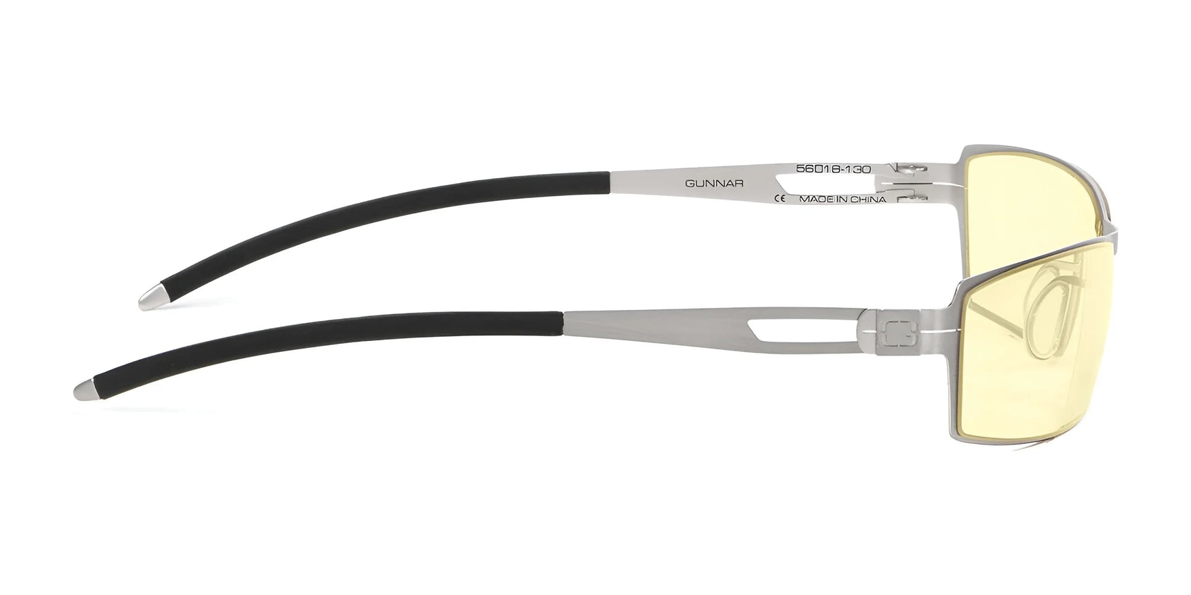 Side view of Gunnar Sheadog Computer Glasses with a silver frame, yellow-tinted lenses, and black temple tips on a white background. These stylish Gunnar specs, size 56, provide headset compatibility for added convenience. Side view of Gunnar Sheadog Computer Glasses with a silver frame, yellow-tinted lenses, and black temple tips on a white background. These stylish Gunnar specs, size 56, provide headset compatibility for added convenience.