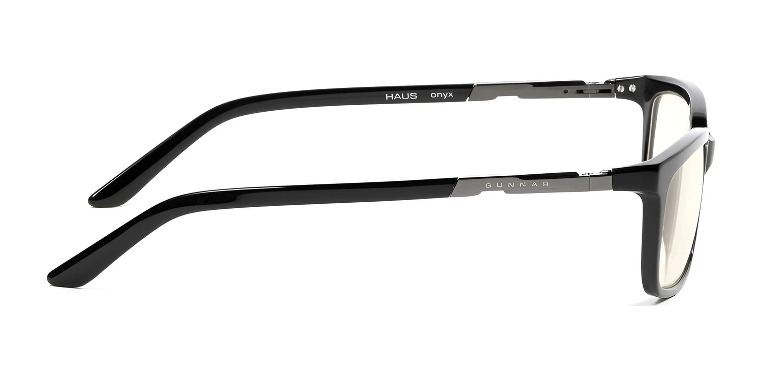 Side view of Gunnar Haus Computer Glasses in black with clear, anti-reflective lenses and "GUNNAR" and "ONYX" engraved on the arms—perfect for blue light blocking and screen protection. Side view of Gunnar Haus Computer Glasses in black with clear, anti-reflective lenses and "GUNNAR" and "ONYX" engraved on the arms—perfect for blue light blocking and screen protection.
