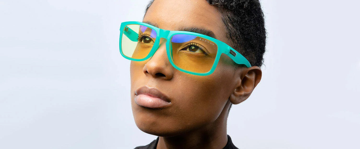 Wearing Gunnar Intercept Computer Glasses, a person gazes upward, enjoying the benefits of blue light protection. Wearing Gunnar Intercept Computer Glasses, a person gazes upward, enjoying the benefits of blue light protection.