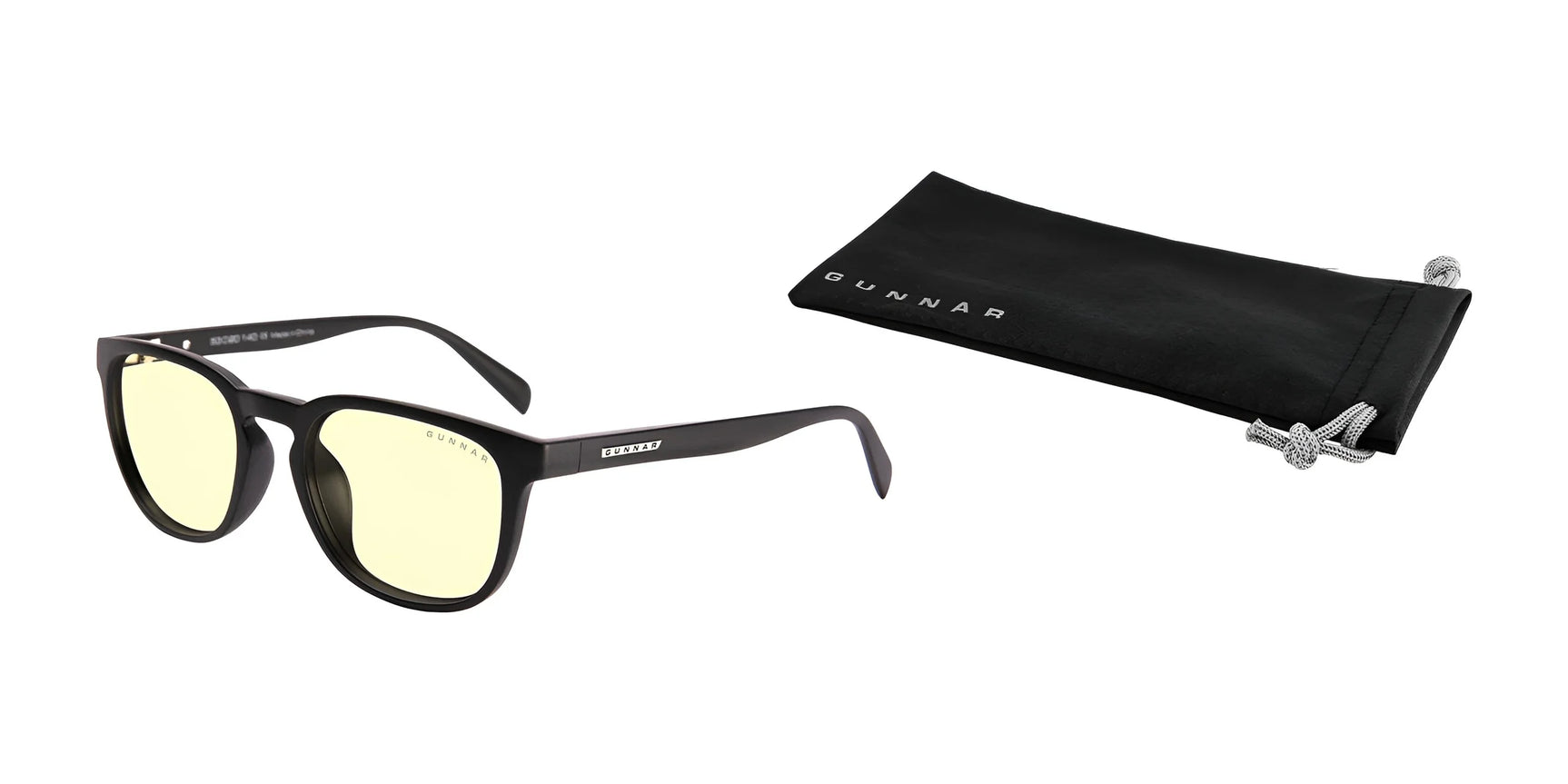 Gunnar's Oakland Computer Glasses in size 53 feature black frames and yellow-tinted lenses for blue light protection, complemented by a sturdy nylon frame. They come with a stylish black pouch, shown on a white background. Gunnar's Oakland Computer Glasses in size 53 feature black frames and yellow-tinted lenses for blue light protection, complemented by a sturdy nylon frame. They come with a stylish black pouch, shown on a white background.