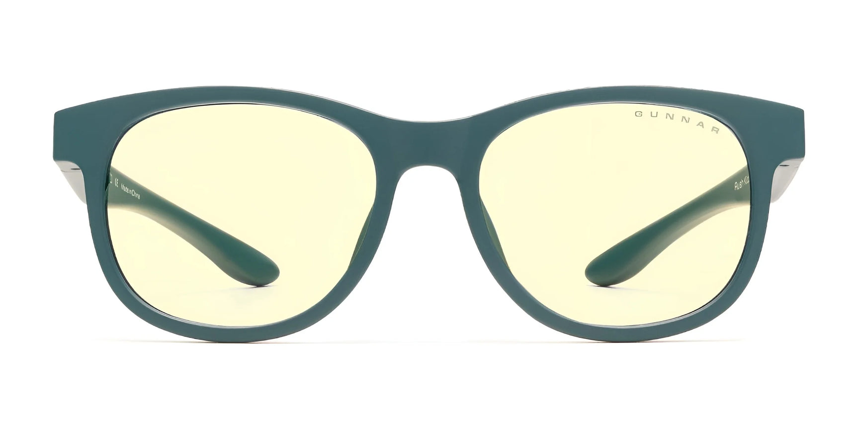 Gunnar's Rush Kids Computer Glasses feature a green frame with yellow-tinted lenses designed to block blue light, ideal for children and teenagers, pictured on a white background. Gunnar's Rush Kids Computer Glasses feature a green frame with yellow-tinted lenses designed to block blue light, ideal for children and teenagers, pictured on a white background.