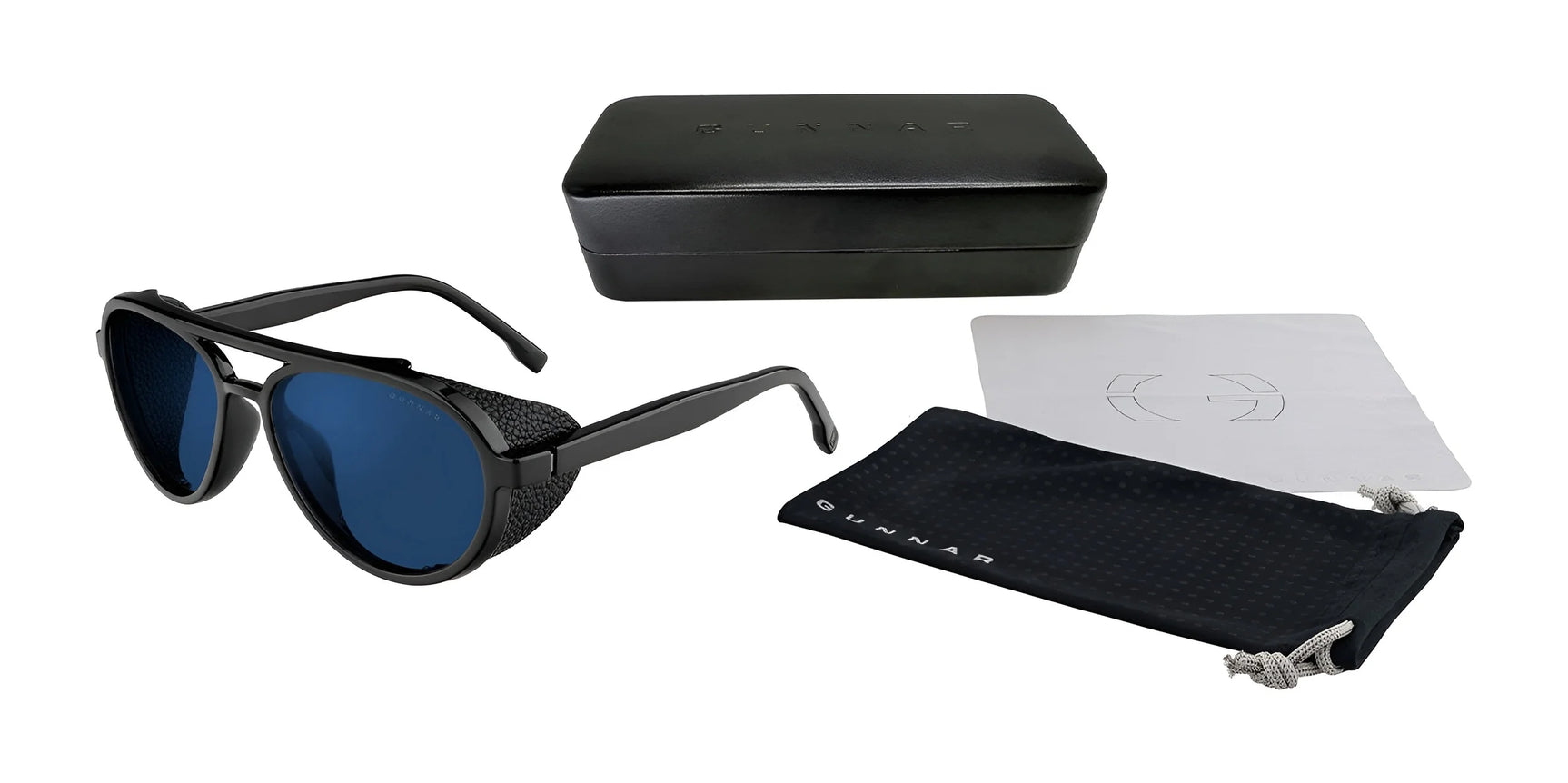 Gunnar Tallac Sunglasses in black, featuring blue light filtering lenses, come with a matching black case, a cleaning cloth, and a drawstring pouch on a white background. Gunnar Tallac Sunglasses in black, featuring blue light filtering lenses, come with a matching black case, a cleaning cloth, and a drawstring pouch on a white background.