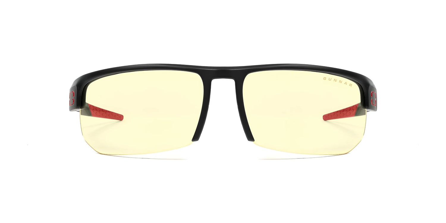 The Gunnar Torpedo 360 Computer Glasses by Gunnar are black-rimmed with yellow-tinted lenses and red temple accents, designed to block blue light. The Gunnar Torpedo 360 Computer Glasses by Gunnar are black-rimmed with yellow-tinted lenses and red temple accents, designed to block blue light.