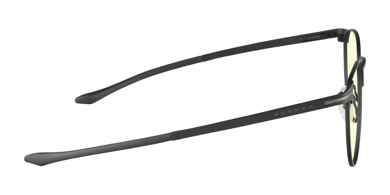 Side view of Gunnar Mateo Computer Glasses, size 52, showcasing black rims, yellow-tinted GUNNAR patented lenses with blue light blocking technology, and sleek, straight temples. Side view of Gunnar Mateo Computer Glasses, size 52, showcasing black rims, yellow-tinted GUNNAR patented lenses with blue light blocking technology, and sleek, straight temples.