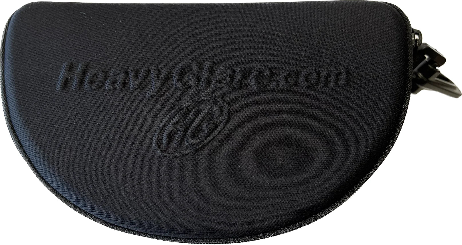 The Heavyglare Eyewear Hard Case is a black zippered protective case for sunglasses or eyeglasses, featuring the "HeavyGlare.com" logo embossed on the front. The Heavyglare Eyewear Hard Case is a black zippered protective case for sunglasses or eyeglasses, featuring the "HeavyGlare.com" logo embossed on the front.