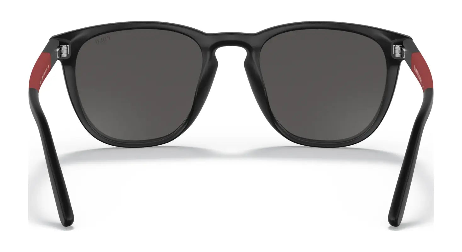 Discover the Polo PH4182U Sunglasses, size 53, featuring a black frame, dark lenses, and stylish red accents on the temple tips. Offering UV protection, these sunglasses from Polo combine fashion and functionality seamlessly. Discover the Polo PH4182U Sunglasses, size 53, featuring a black frame, dark lenses, and stylish red accents on the temple tips. Offering UV protection, these sunglasses from Polo combine fashion and functionality seamlessly.