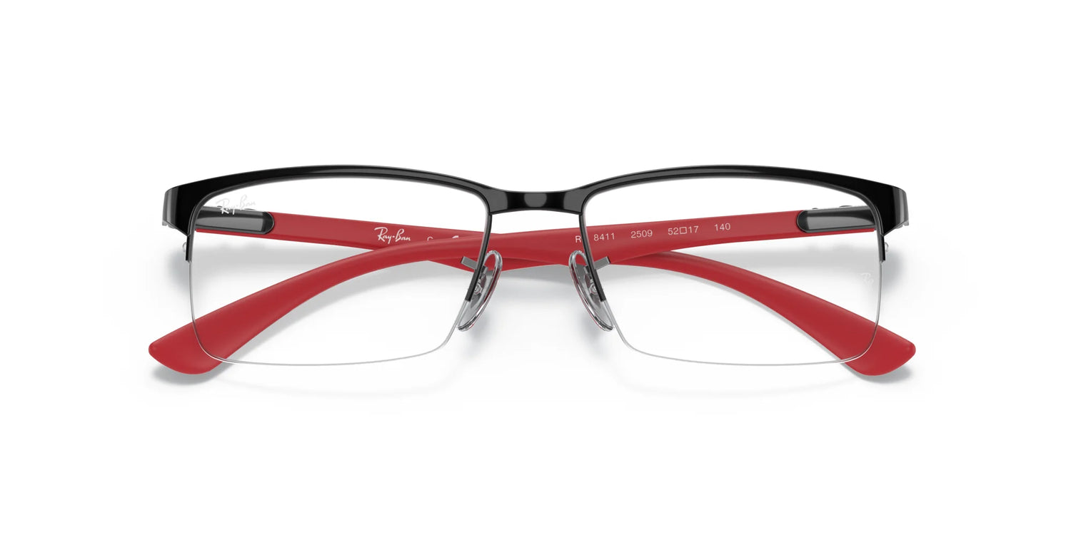 The Ray-Ban RX8411 Eyeglasses in size 54 feature trendy black frames with red arms, delivering a bold look when viewed from the front. The Ray-Ban RX8411 Eyeglasses in size 54 feature trendy black frames with red arms, delivering a bold look when viewed from the front.
