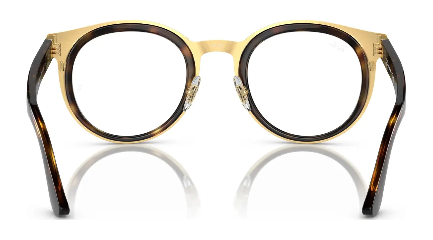 Ray-Ban BONNIE RB3710 Eyeglasses in Size 50 featuring round tortoiseshell frames, gold accents, and plastic rims are shown from the front on a white background. Ray-Ban BONNIE RB3710 Eyeglasses in Size 50 featuring round tortoiseshell frames, gold accents, and plastic rims are shown from the front on a white background.