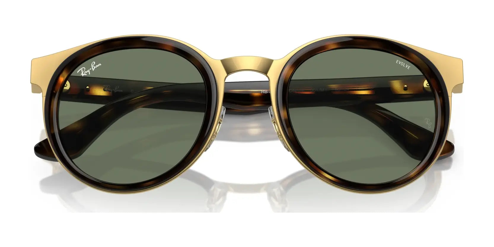 The Ray-Ban BONNIE RB3710 eyeglasses offer a classic look with their round silhouette, gold frames, and tortoiseshell accents, enhanced by stylish green lenses. Ideal for those who appreciate refined design. Size 50. The Ray-Ban BONNIE RB3710 eyeglasses offer a classic look with their round silhouette, gold frames, and tortoiseshell accents, enhanced by stylish green lenses. Ideal for those who appreciate refined design. Size 50.