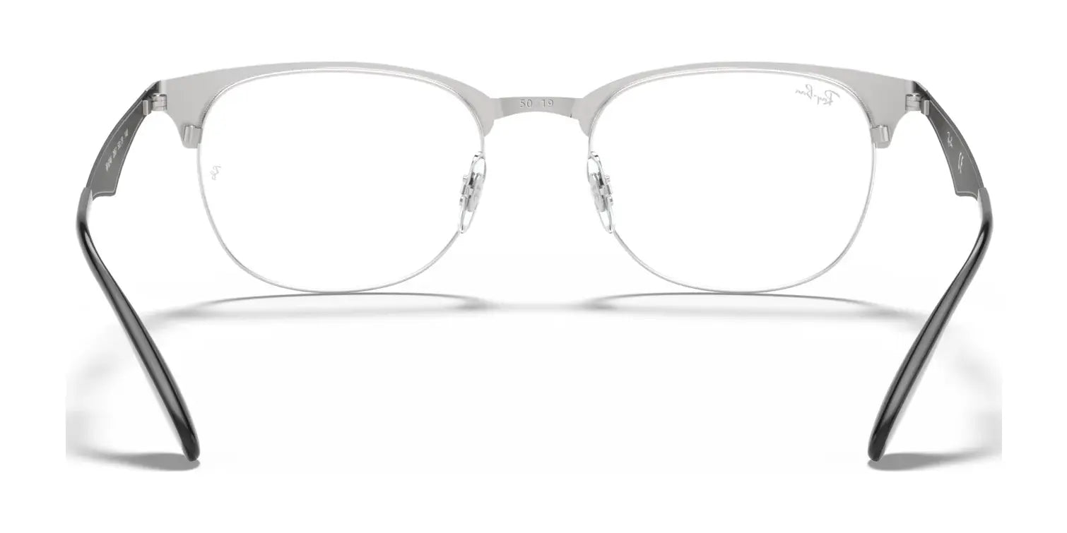 A pair of Ray-Ban RX6346 eyeglasses, featuring metal frames and adjustable nosepads for crystal-clear vision, viewed from the front. A pair of Ray-Ban RX6346 eyeglasses, featuring metal frames and adjustable nosepads for crystal-clear vision, viewed from the front.