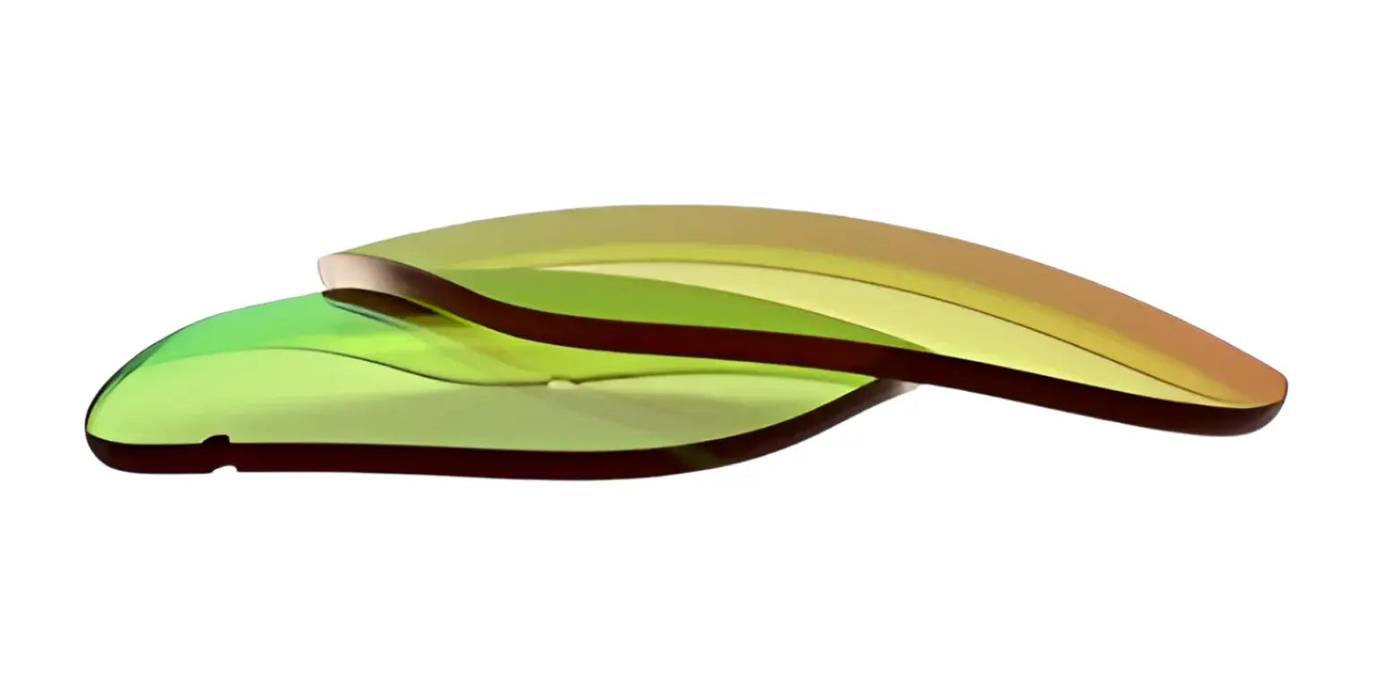 Two curved, translucent RE Ranger Classic Lenses by RE Ranger in yellow and green are stacked on a white background. Two curved, translucent RE Ranger Classic Lenses by RE Ranger in yellow and green are stacked on a white background.