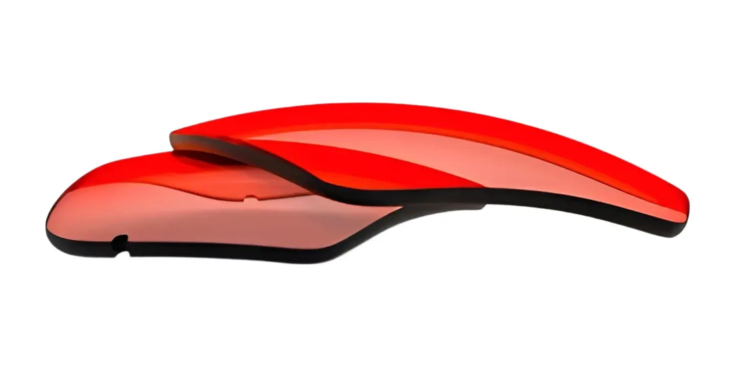 Two RE Ranger Edge red-tinted curved plastic lenses, featuring Claysight Lens Technology from RE Ranger, are stacked against a white background. Two RE Ranger Edge red-tinted curved plastic lenses, featuring Claysight Lens Technology from RE Ranger, are stacked against a white background.