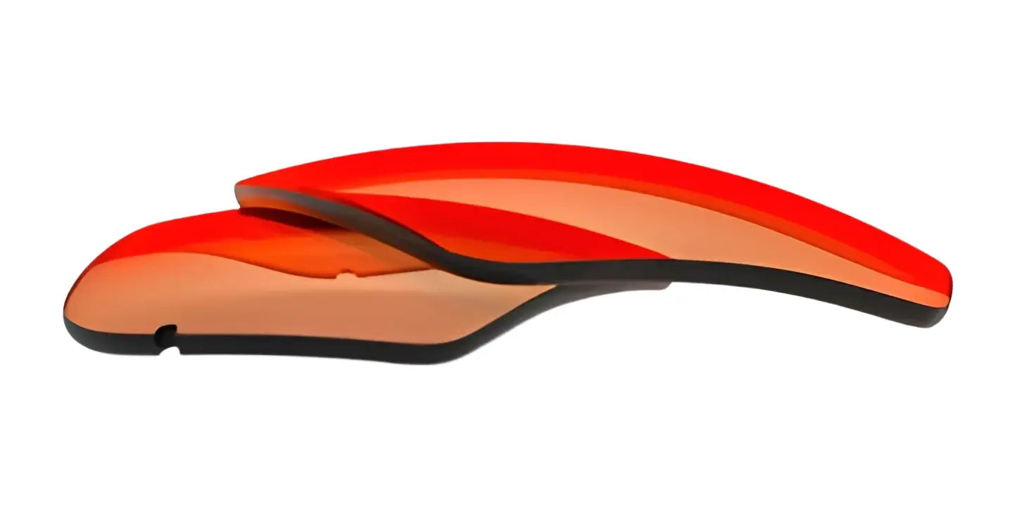Two curved, orange-tinted RE Ranger Edge Lens sunglass lenses featuring Claysight Lens Technology are stacked on a white background. Two curved, orange-tinted RE Ranger Edge Lens sunglass lenses featuring Claysight Lens Technology are stacked on a white background.