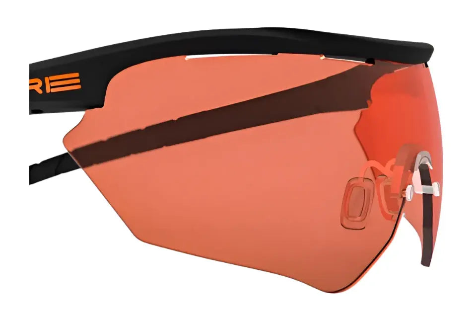 Close-up of RE Ranger Phantom 2.0 Lens, featuring orange-tinted Claysight lens technology, a sleek black frame, and adjustable nose pads by RE Ranger. Close-up of RE Ranger Phantom 2.0 Lens, featuring orange-tinted Claysight lens technology, a sleek black frame, and adjustable nose pads by RE Ranger.