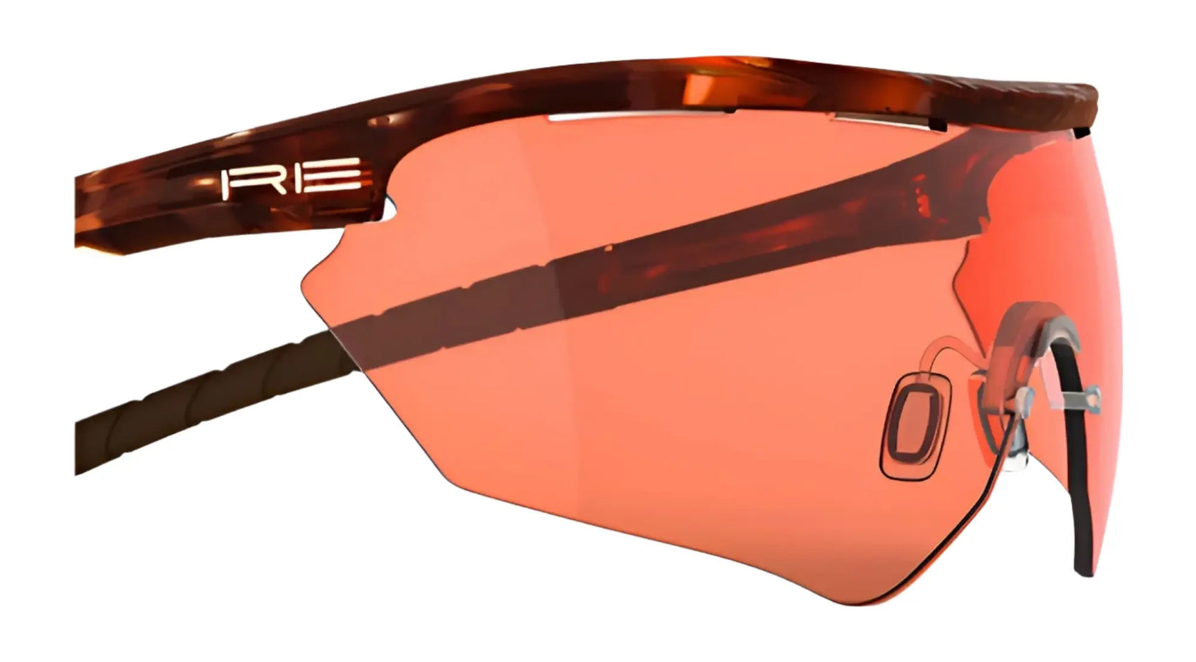 Close-up of brown RE Ranger Phantom 2.0 Shooting Sunglasses (Size 146) by RE Ranger, featuring a single red-tinted Claysight lens and the "RE" logo on the frame. Close-up of brown RE Ranger Phantom 2.0 Shooting Sunglasses (Size 146) by RE Ranger, featuring a single red-tinted Claysight lens and the "RE" logo on the frame.
