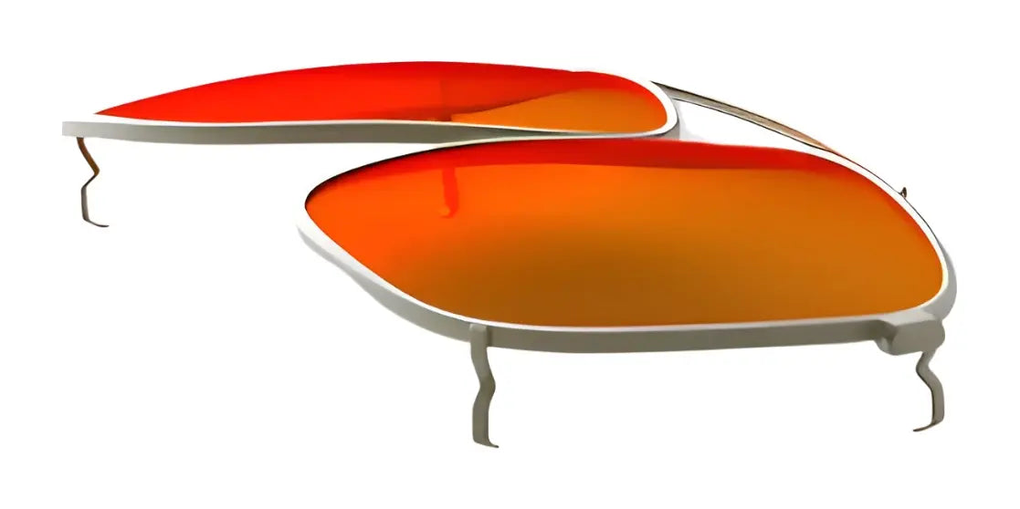 Close-up of orange-tinted RE Ranger Sporter Clip-On Lens with silver frames, detached and lying on a white background. Close-up of orange-tinted RE Ranger Sporter Clip-On Lens with silver frames, detached and lying on a white background.