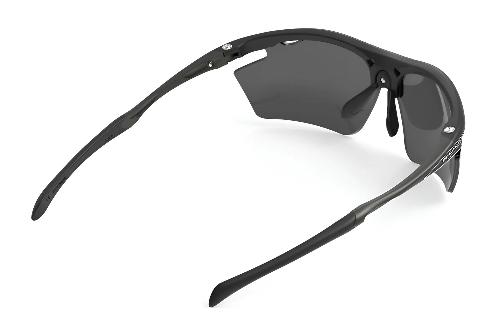Rudy Project Agon Sunglasses in black, size 68, feature wraparound design with dark interchangeable lenses and adjustable anti-slip temples for a secure cycling fit. Displayed on a white background, viewed from the back and side. Rudy Project Agon Sunglasses in black, size 68, feature wraparound design with dark interchangeable lenses and adjustable anti-slip temples for a secure cycling fit. Displayed on a white background, viewed from the back and side.