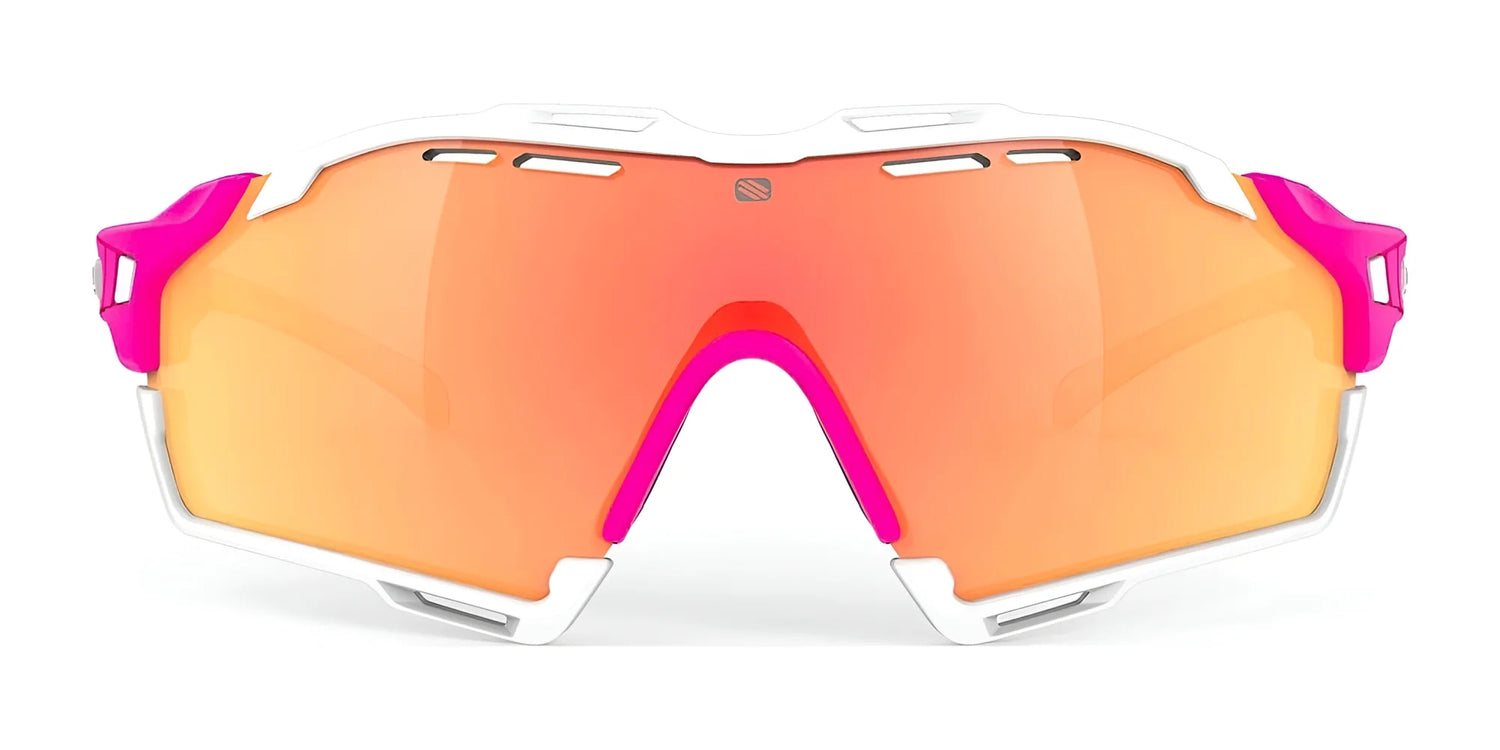 The Rudy Project Cutline Sunglasses by Rudy Project feature a sporty pink and white frame, large orange mirrored lenses, and adaptive temple tips for comfort, viewed from the front. The Rudy Project Cutline Sunglasses by Rudy Project feature a sporty pink and white frame, large orange mirrored lenses, and adaptive temple tips for comfort, viewed from the front.