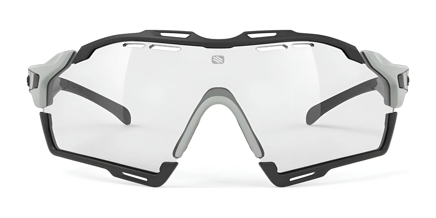 The Rudy Project Cutline Sunglasses by Rudy Project feature a black and gray frame with clear lenses, shown front-facing on a white background. Adaptive temple tips ensure a secure fit for any activity. The Rudy Project Cutline Sunglasses by Rudy Project feature a black and gray frame with clear lenses, shown front-facing on a white background. Adaptive temple tips ensure a secure fit for any activity.