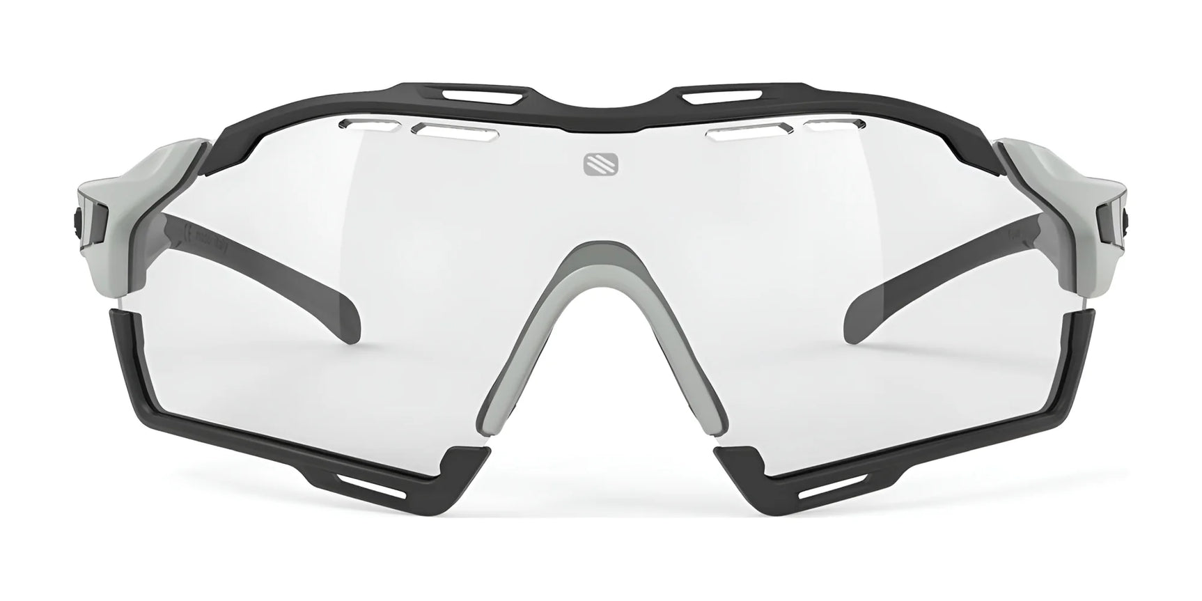The Rudy Project Cutline Sunglasses by Rudy Project feature a black and gray frame with clear lenses, shown front-facing on a white background. Adaptive temple tips ensure a secure fit for any activity. The Rudy Project Cutline Sunglasses by Rudy Project feature a black and gray frame with clear lenses, shown front-facing on a white background. Adaptive temple tips ensure a secure fit for any activity.