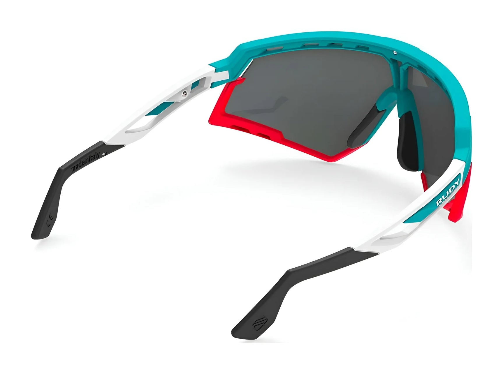 The Rudy Project Defender Sunglasses (Size 141) feature a teal, white, and red frame with large dark lenses—shown from the rear—perfect for prescription eyewear users seeking style and function. The Rudy Project Defender Sunglasses (Size 141) feature a teal, white, and red frame with large dark lenses—shown from the rear—perfect for prescription eyewear users seeking style and function.