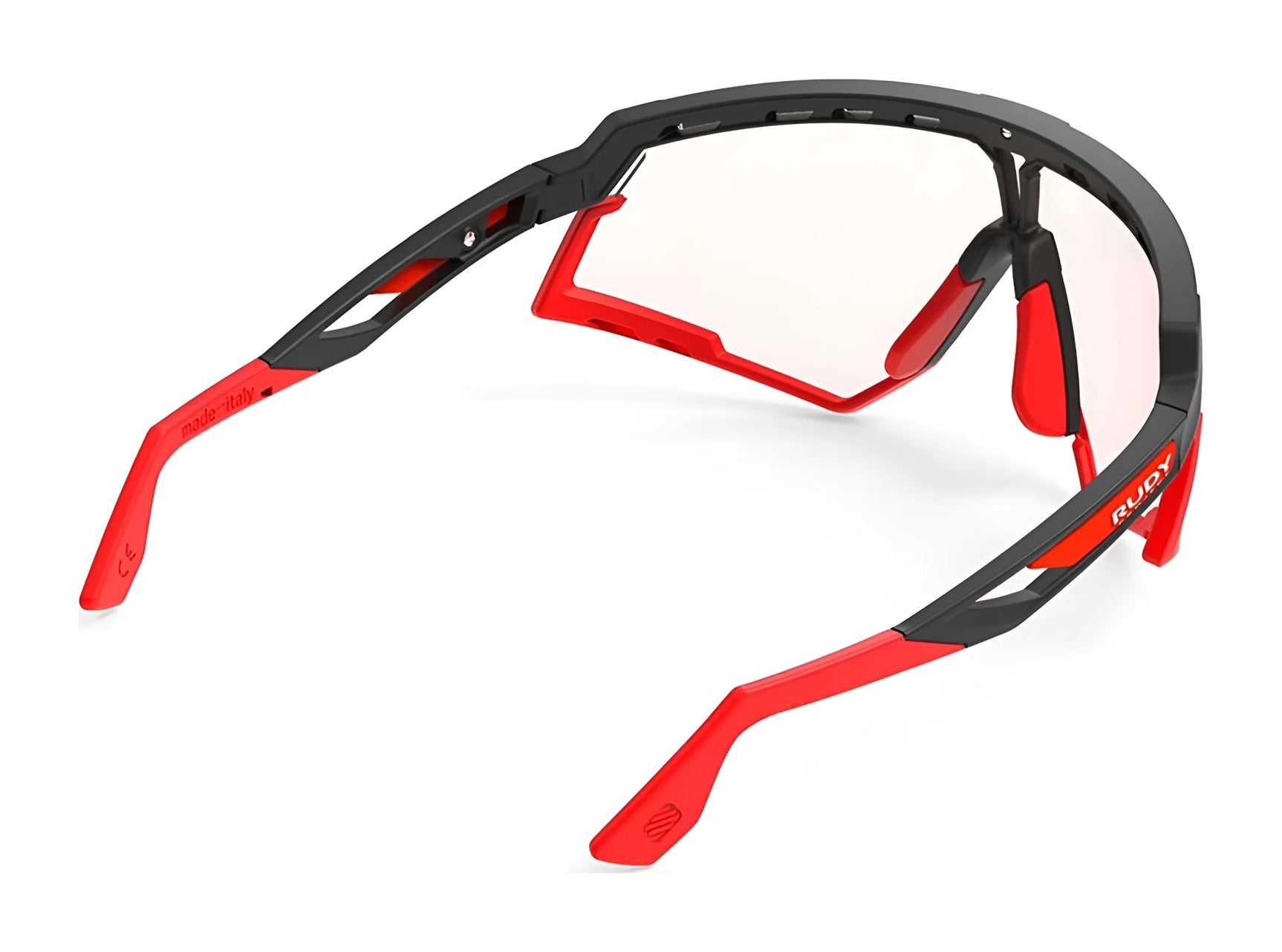 Rudy Project Defender Sunglasses in red and black, size 141, with interchangeable lenses and clear prescription option, shown from the rear on a white background. Rudy Project Defender Sunglasses in red and black, size 141, with interchangeable lenses and clear prescription option, shown from the rear on a white background.