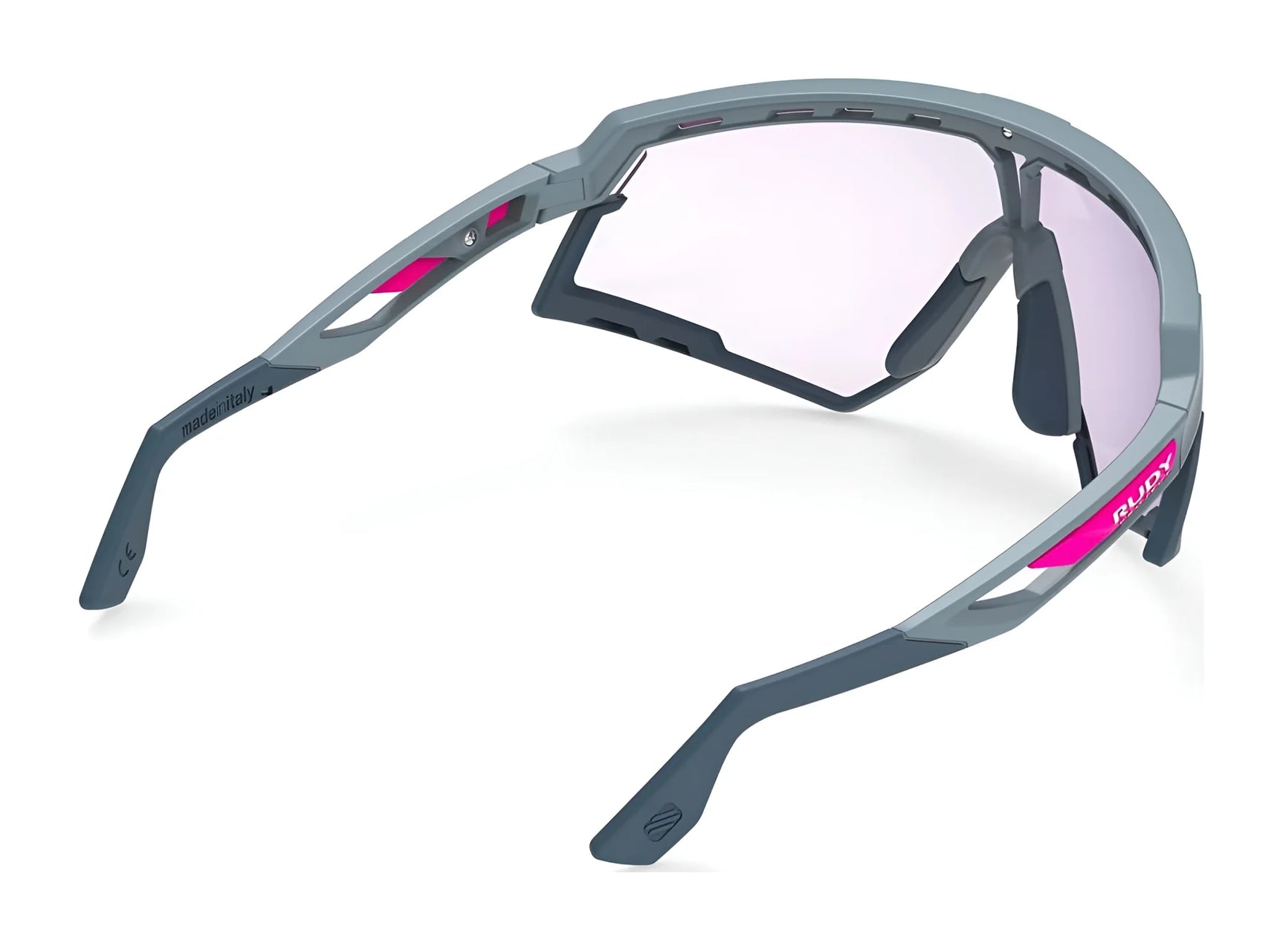 Rudy Project Defender Sunglasses | Size 141 by Rudy Project feature a gray frame with pink accents, a semi-rimless lens design shown from the rear, and support interchangeable lenses for versatile performance in different light conditions. Rudy Project Defender Sunglasses | Size 141 by Rudy Project feature a gray frame with pink accents, a semi-rimless lens design shown from the rear, and support interchangeable lenses for versatile performance in different light conditions.
