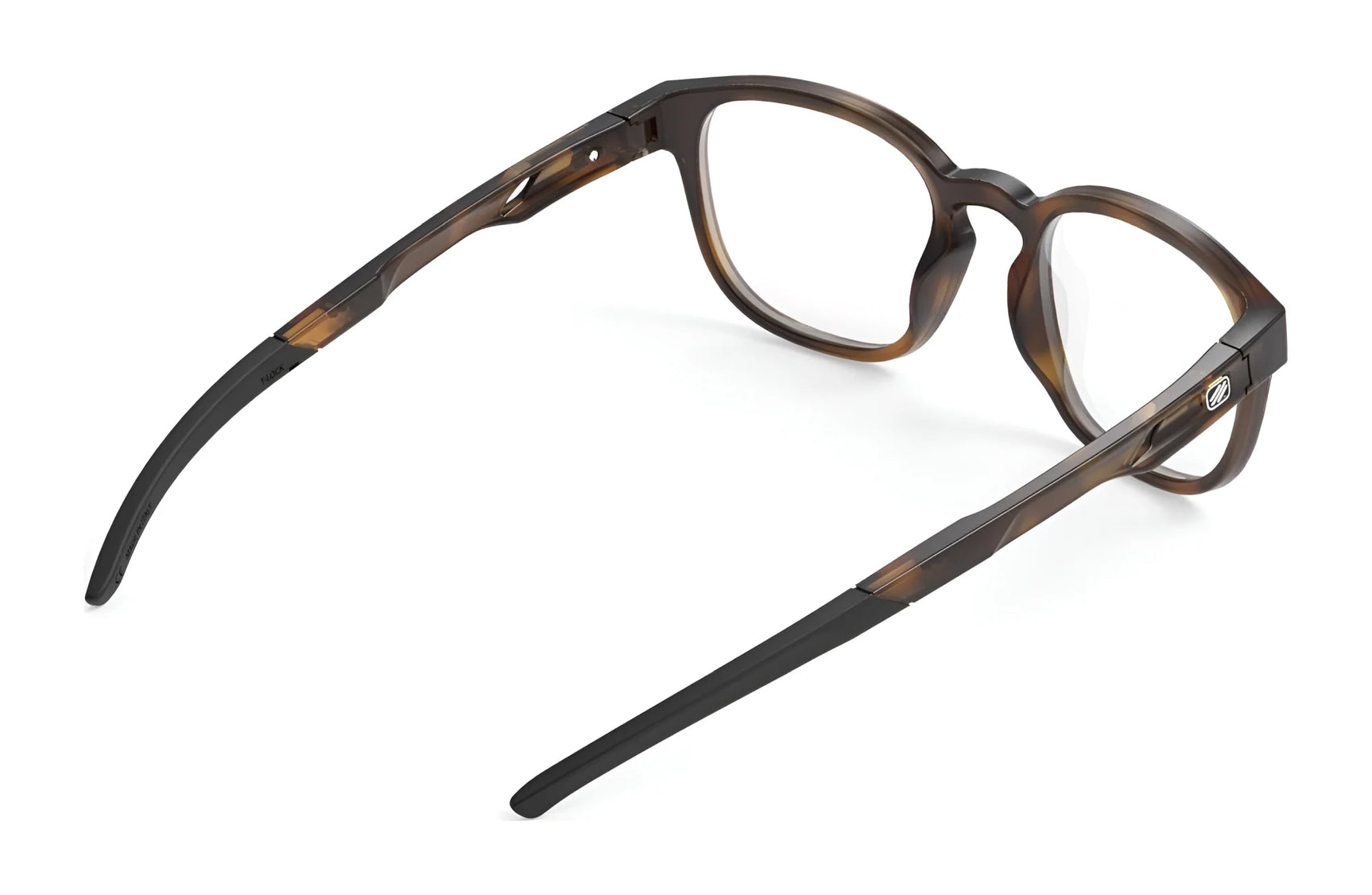 The Rudy Project Iridis 66 Eyeglasses in size 51 feature a durable Grilamid frame in brown and black, designed for sports and everyday use—shown from behind to highlight the sturdy temple arms against a white background. The Rudy Project Iridis 66 Eyeglasses in size 51 feature a durable Grilamid frame in brown and black, designed for sports and everyday use—shown from behind to highlight the sturdy temple arms against a white background.