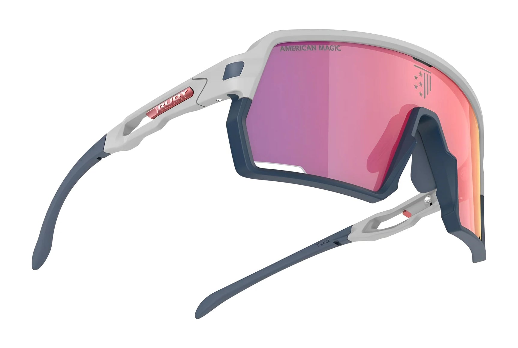 Rudy Project Kelion Sunglasses (Size 144) feature a white/navy blue frame, pink reflective lenses, UV protection, and "American Magic" text—combining style and safety for every adventure. Rudy Project Kelion Sunglasses (Size 144) feature a white/navy blue frame, pink reflective lenses, UV protection, and "American Magic" text—combining style and safety for every adventure.