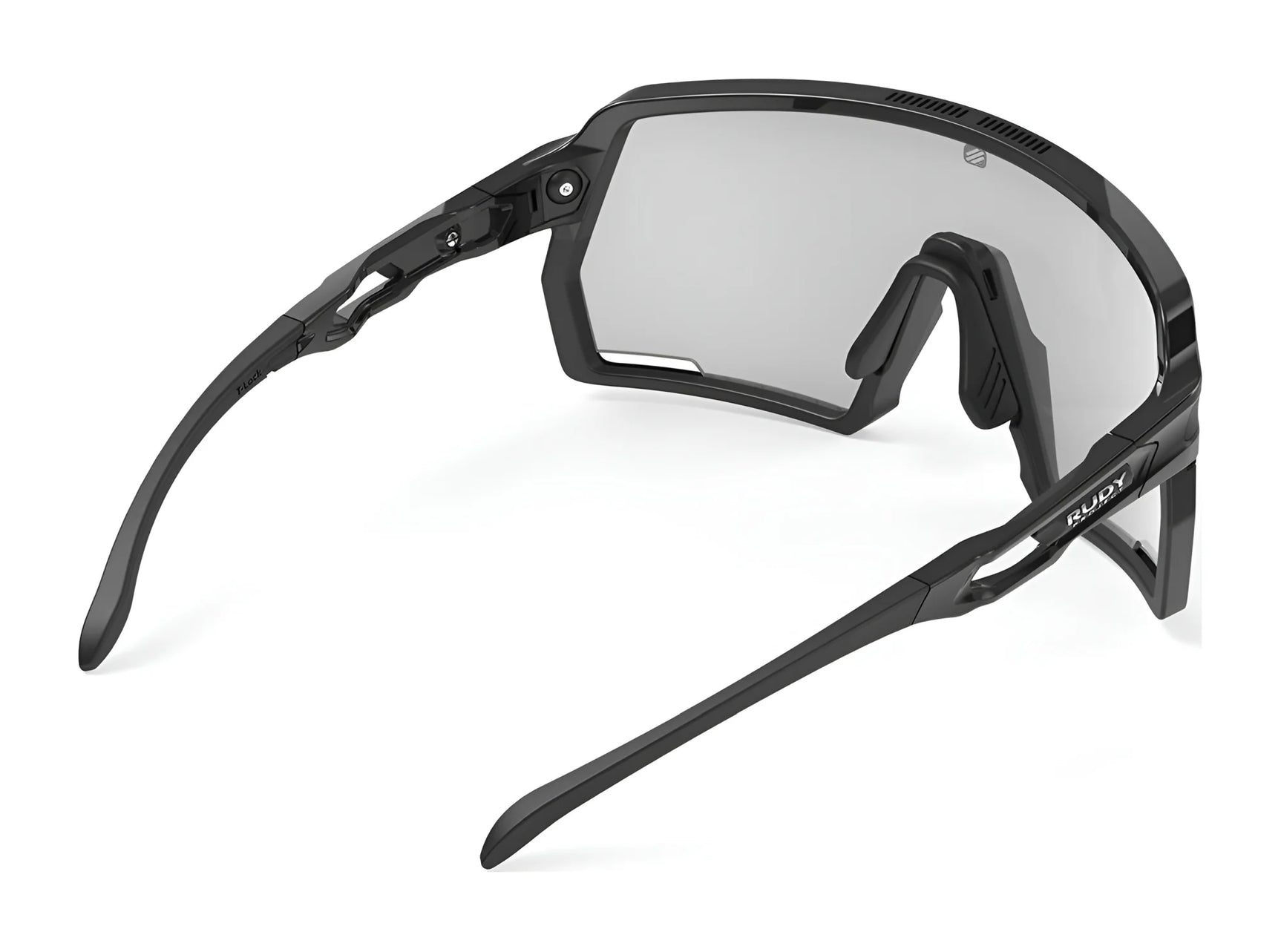The Rudy Project Kelion Sunglasses | Size 144 by Rudy Project are black sports sunglasses with a large, single clear lens and adjustable nose pads, shown at an angle. They provide UV protection for outdoor activities. The Rudy Project Kelion Sunglasses | Size 144 by Rudy Project are black sports sunglasses with a large, single clear lens and adjustable nose pads, shown at an angle. They provide UV protection for outdoor activities.