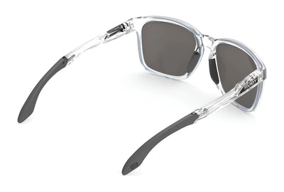 Rudy Project Lightflow A Sunglasses (Size 57) with clear frames, black lenses, and black temple tips shown from a rear angle. UV protection included.