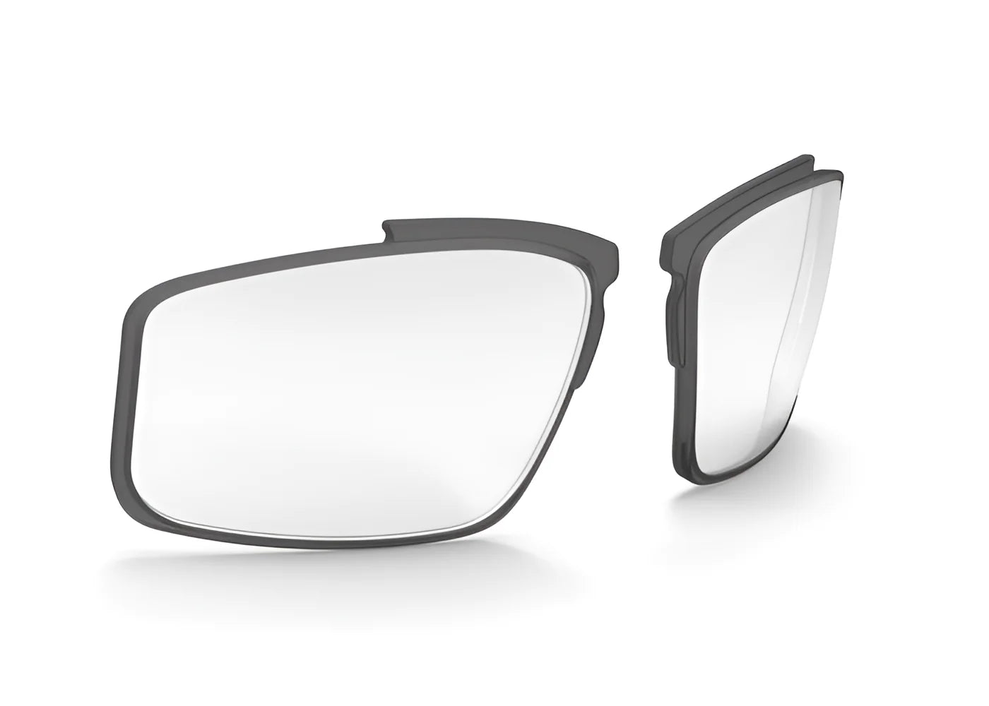 Two interchangeable Rudy Project VULCAN Rx Clips with dark frames, specifically designed for glasses, are displayed against a white background, showcasing impressive prescription adaptability. Two interchangeable Rudy Project VULCAN Rx Clips with dark frames, specifically designed for glasses, are displayed against a white background, showcasing impressive prescription adaptability.
