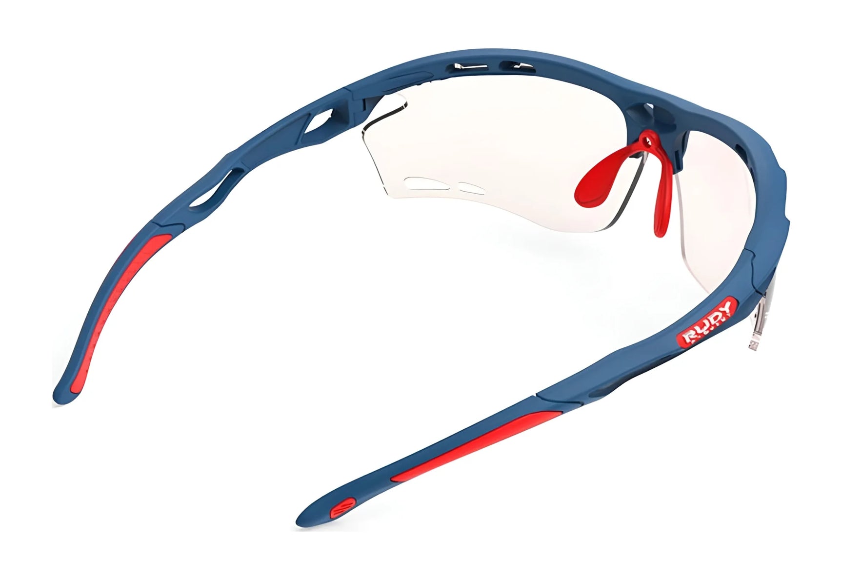 Rudy Project Propulse Sunglasses in blue and red with clear lenses, size 75. Features an adjustable nosepiece for a secure fit. Side and slightly above view. Brand: Rudy Project. Rudy Project Propulse Sunglasses in blue and red with clear lenses, size 75. Features an adjustable nosepiece for a secure fit. Side and slightly above view. Brand: Rudy Project.
