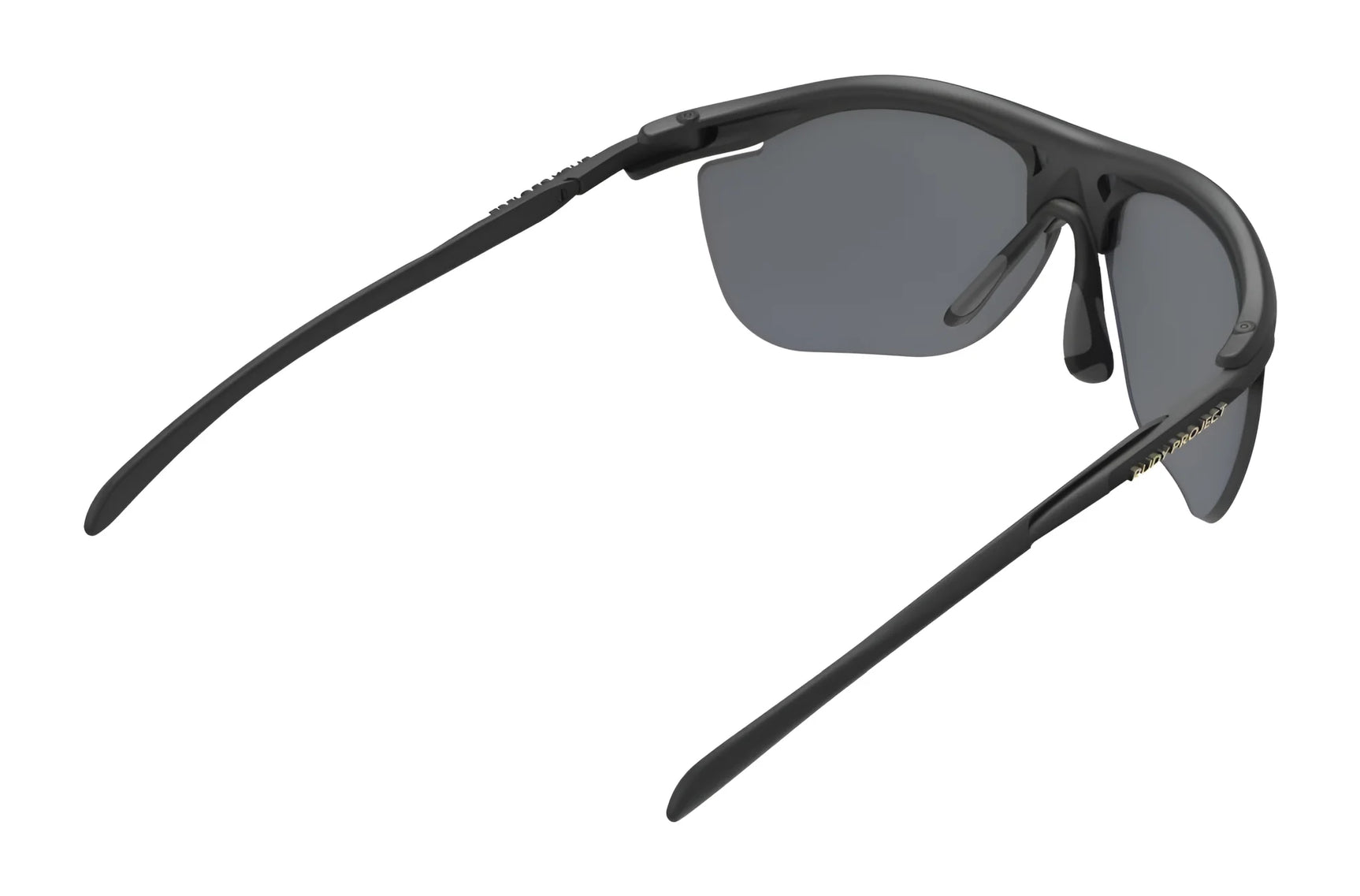 The Rudy Project Rydon Slim Curva Sunglasses (Size 64) by Rudy Project feature black wraparound frames and dark lenses, viewed from the back and side, providing full UV protection for your eyes. The Rudy Project Rydon Slim Curva Sunglasses (Size 64) by Rudy Project feature black wraparound frames and dark lenses, viewed from the back and side, providing full UV protection for your eyes.